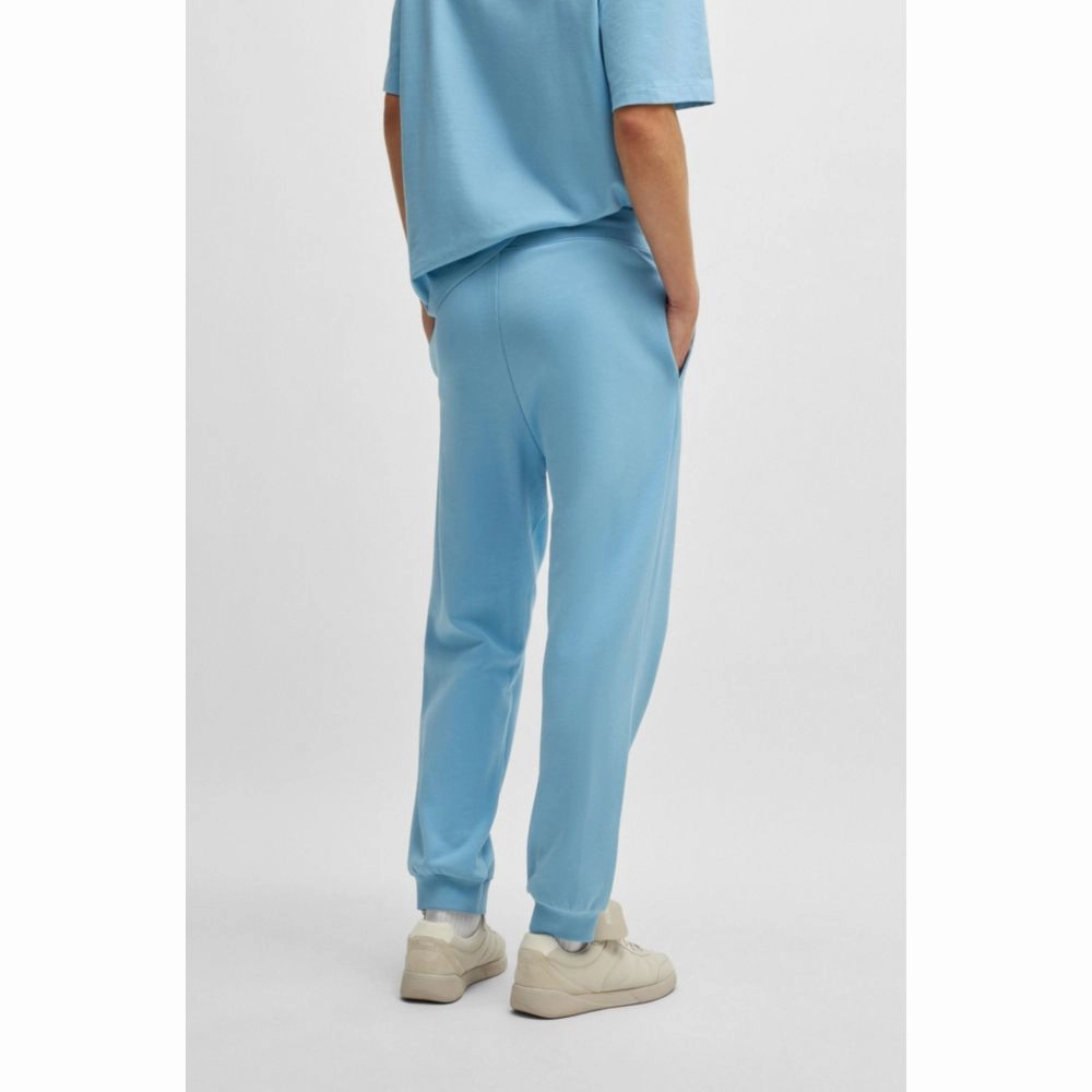 Cotton-terry tracksuit bottoms with Happy HUGO logo patch