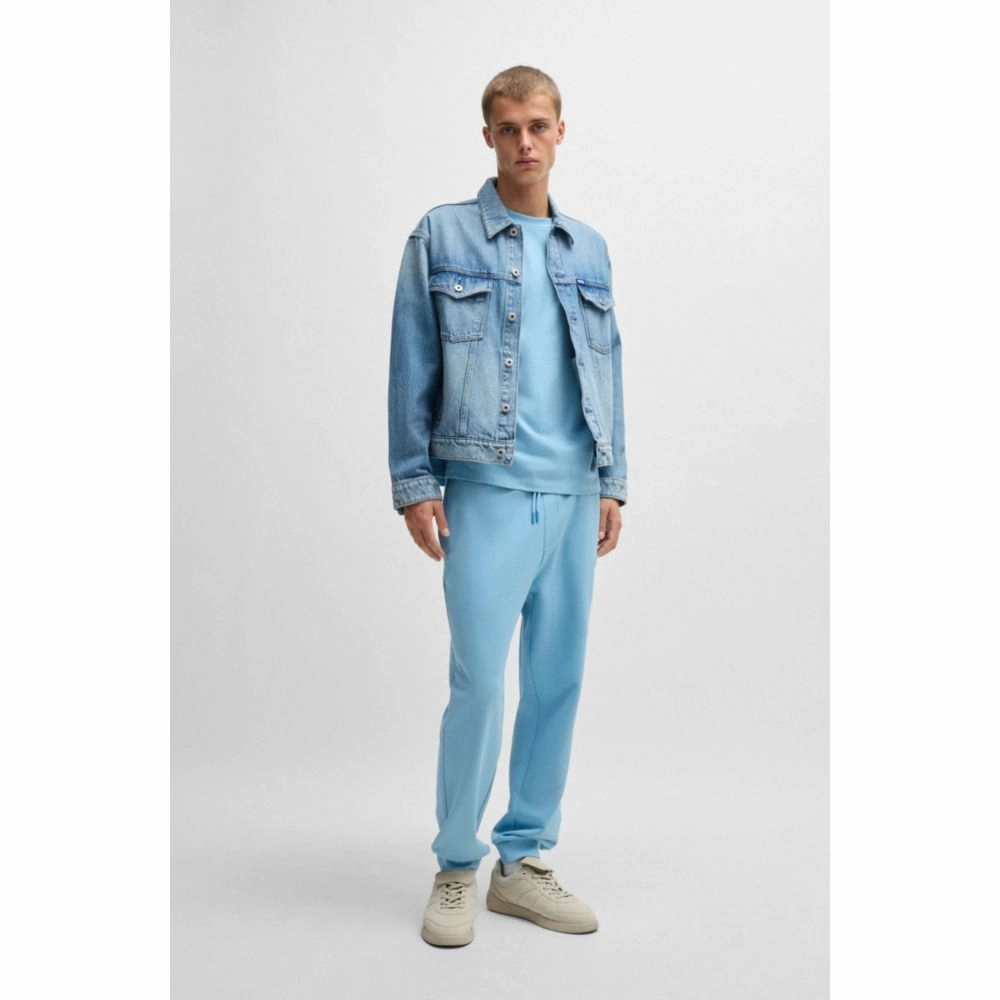 Cotton-terry tracksuit bottoms with Happy HUGO logo patch