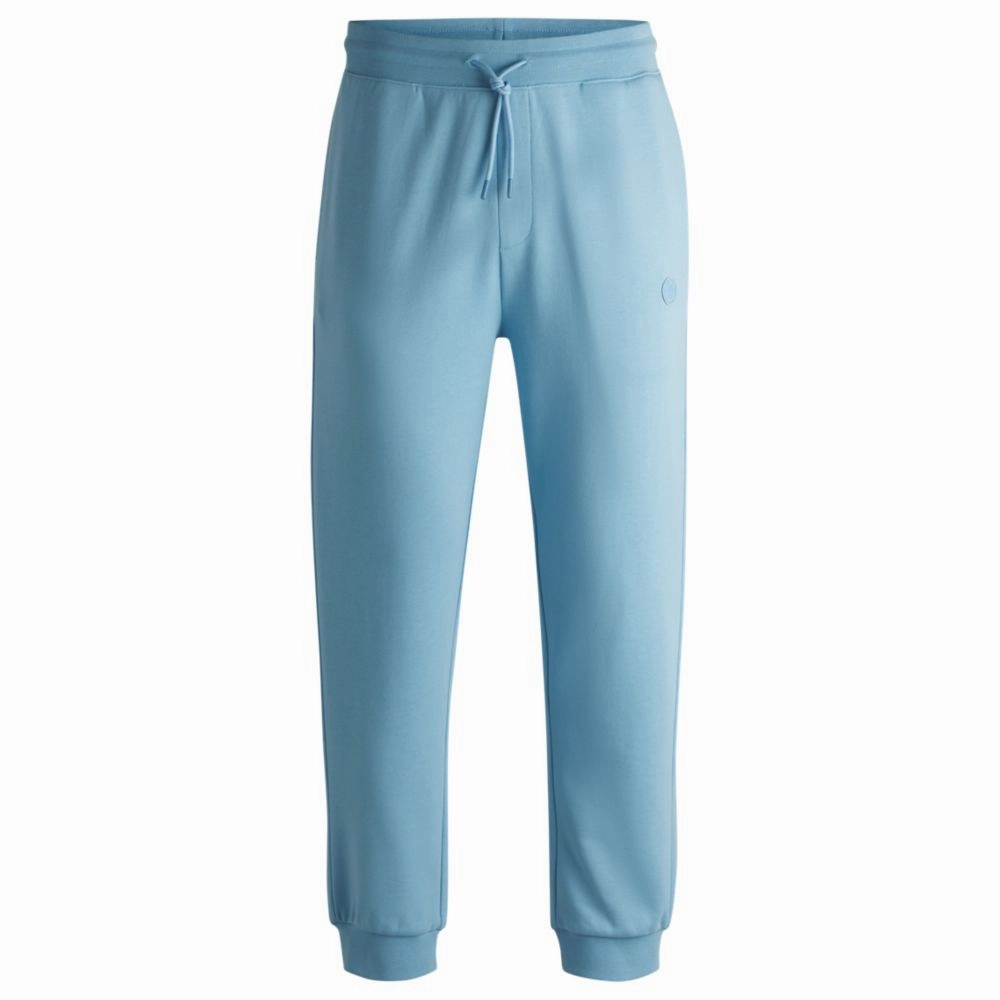 Cotton-terry tracksuit bottoms with Happy HUGO logo patch