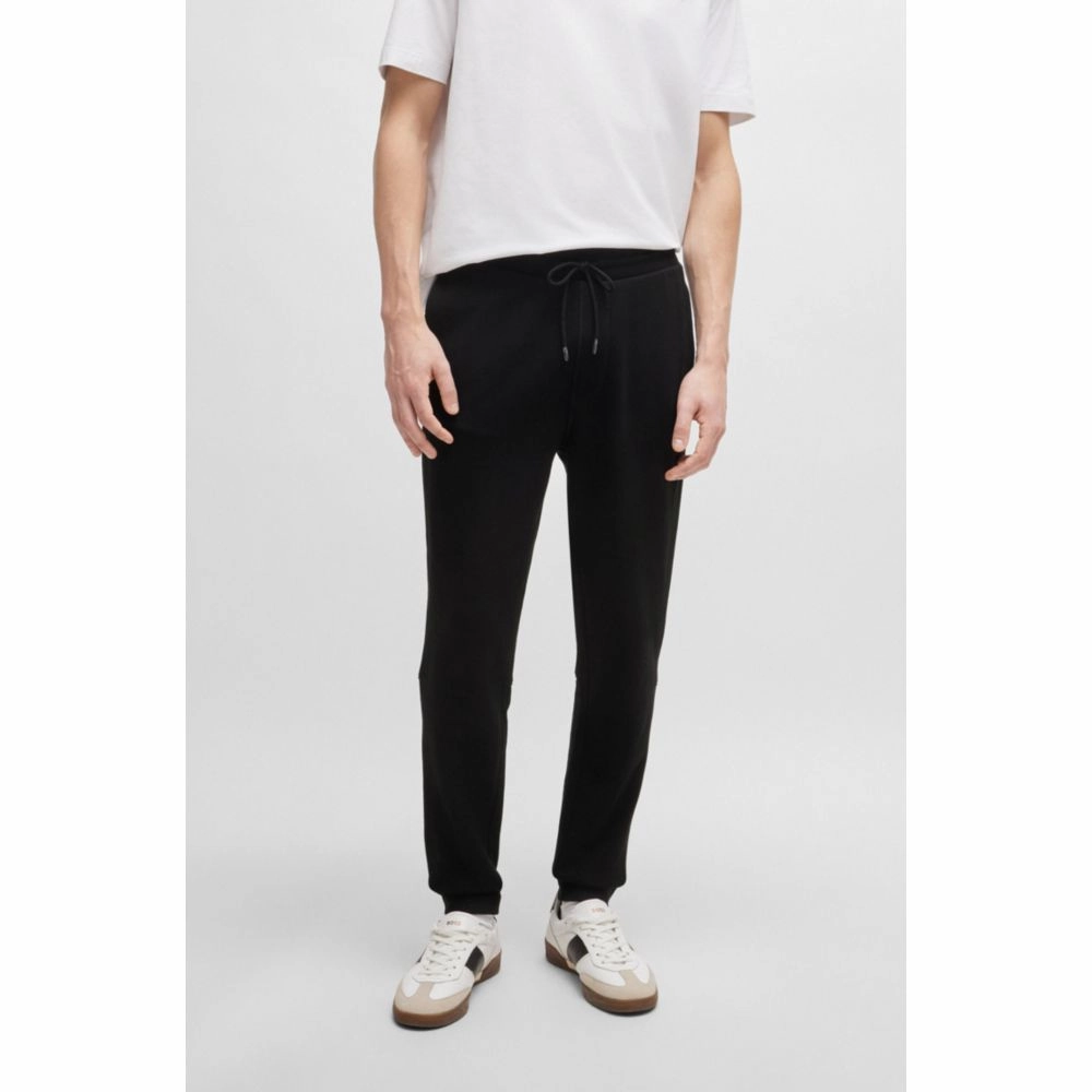 Cotton-terry tracksuit bottoms with logo patch