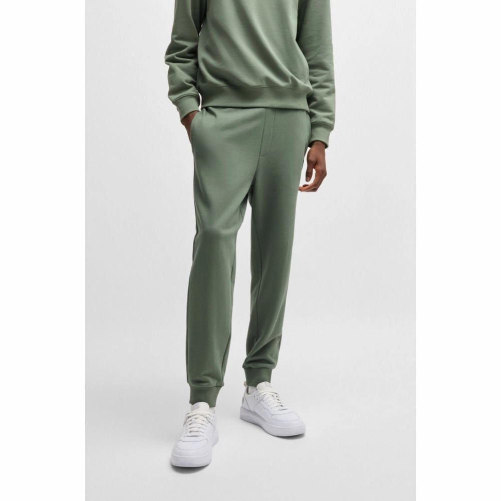 Cotton-terry tracksuit bottoms with logo print