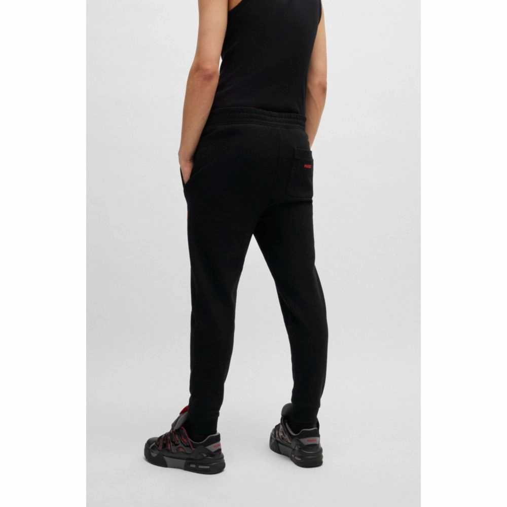Cotton-terry tracksuit bottoms with puffed flame logo