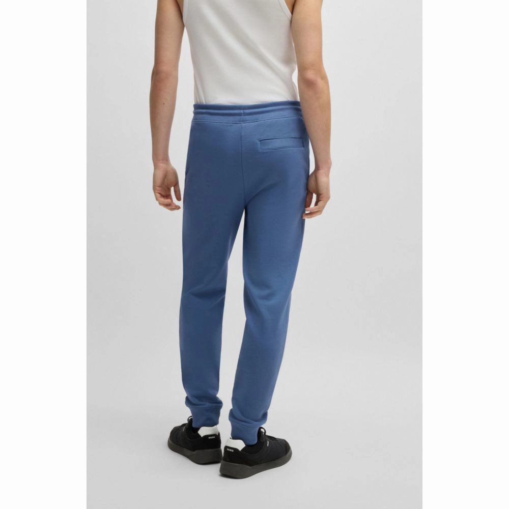 Cotton-terry tracksuit bottoms with red logo label