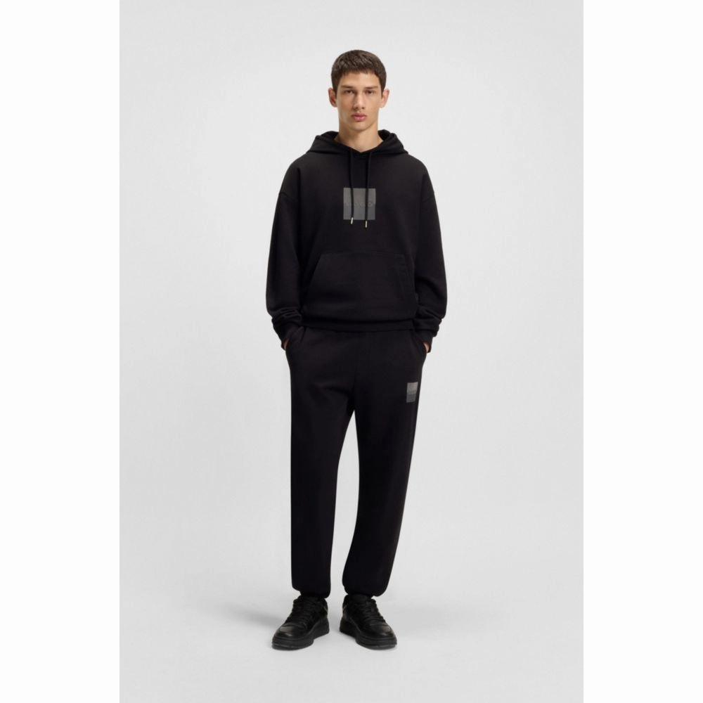 Cotton-terry tracksuit bottoms with split logo