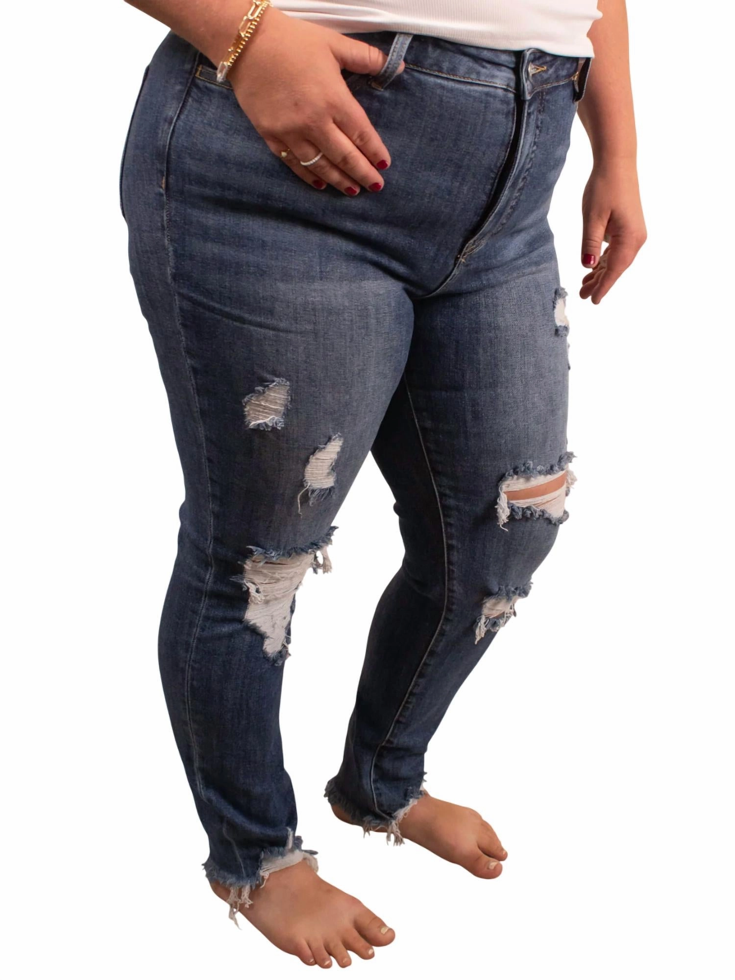 Distressed Skinny Jean In Dark Wash