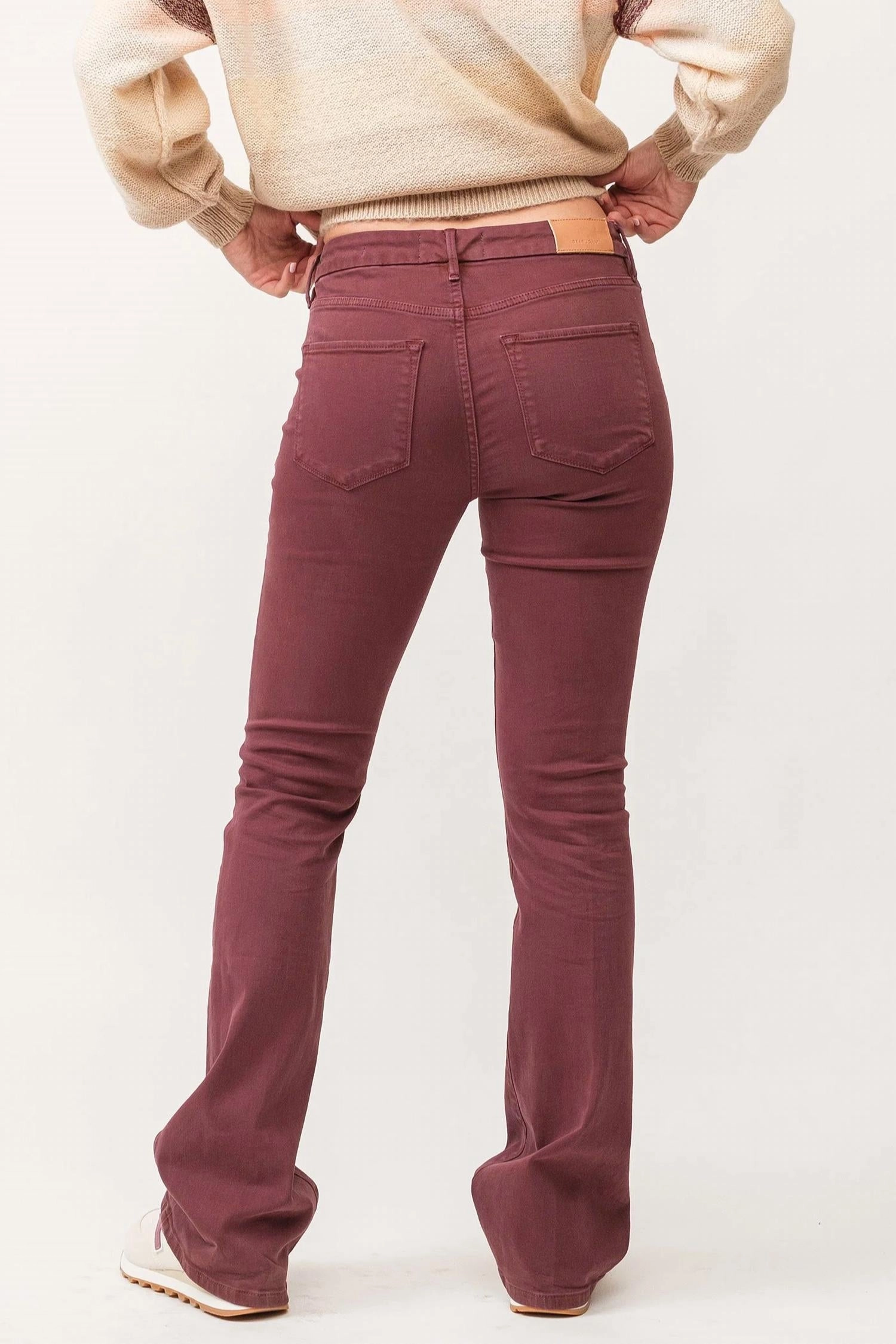 Jaxtyn Mid Rise Clean Hem Bootcut Jeans In Maroon