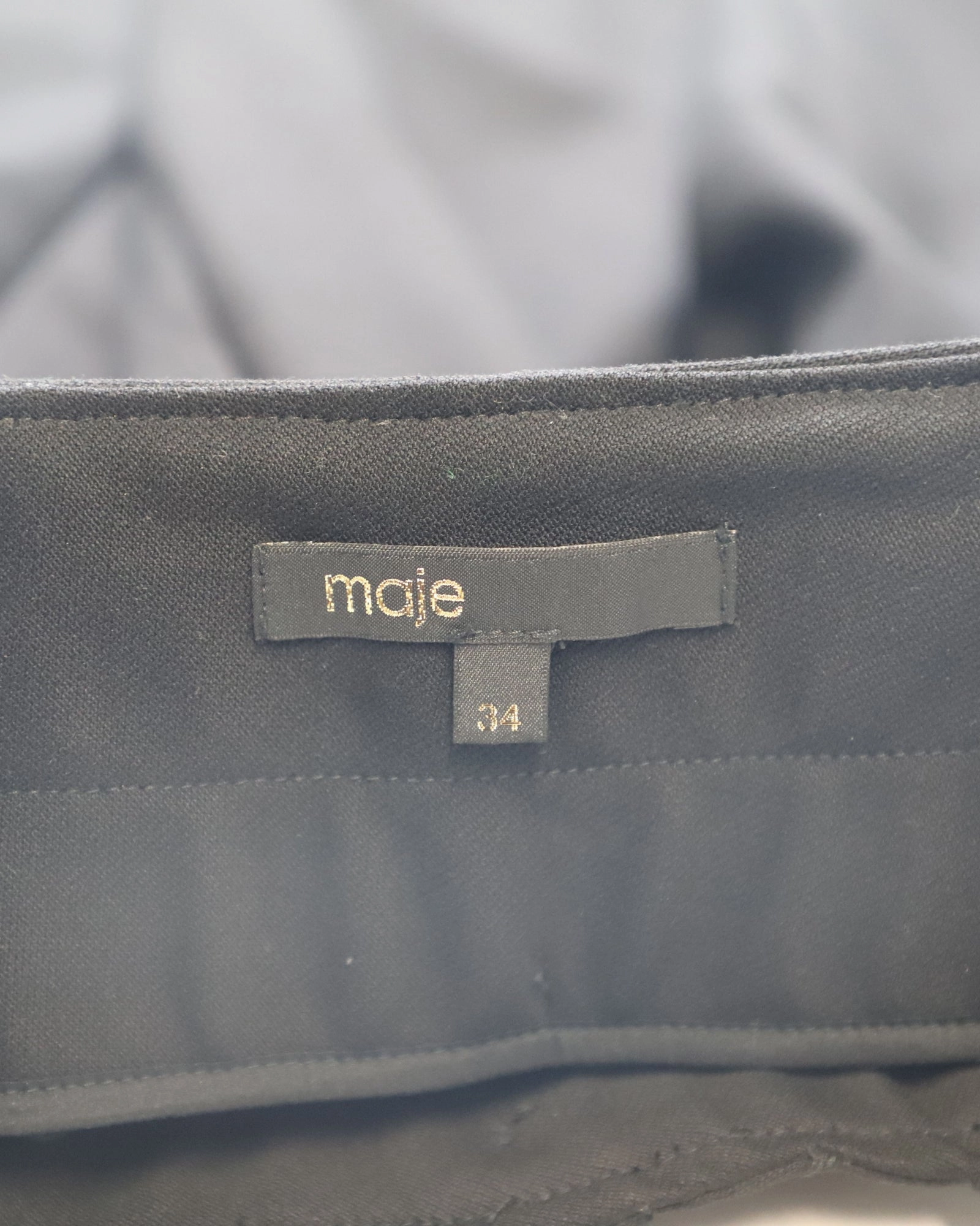 Maje Button Front Pleated Skirt in Black Cotton