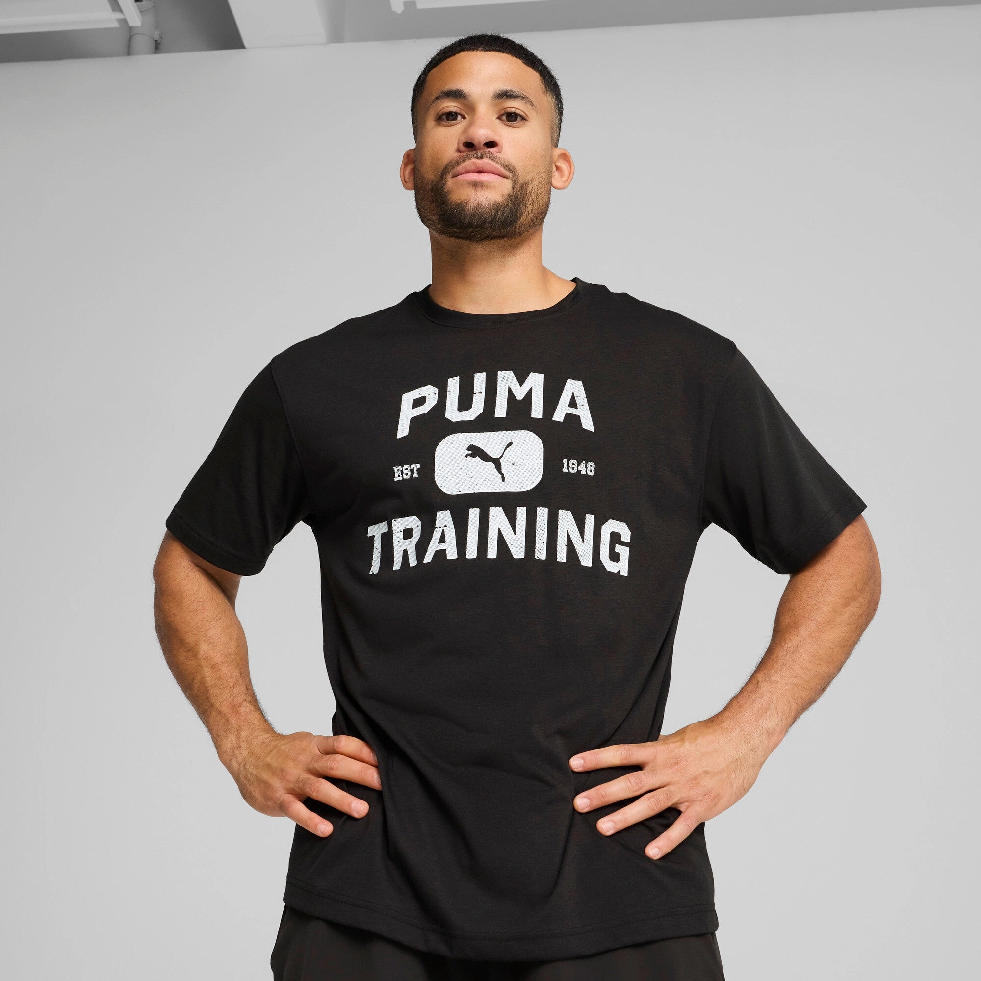 PUMA GRAPHICS Logo Men's Relaxed Training Tee