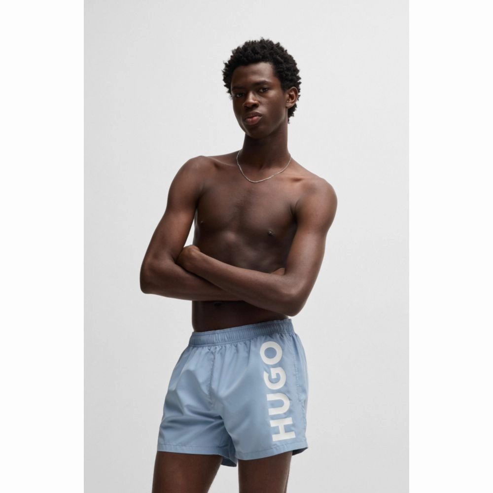 Quick-dry swim shorts with vertical logo print