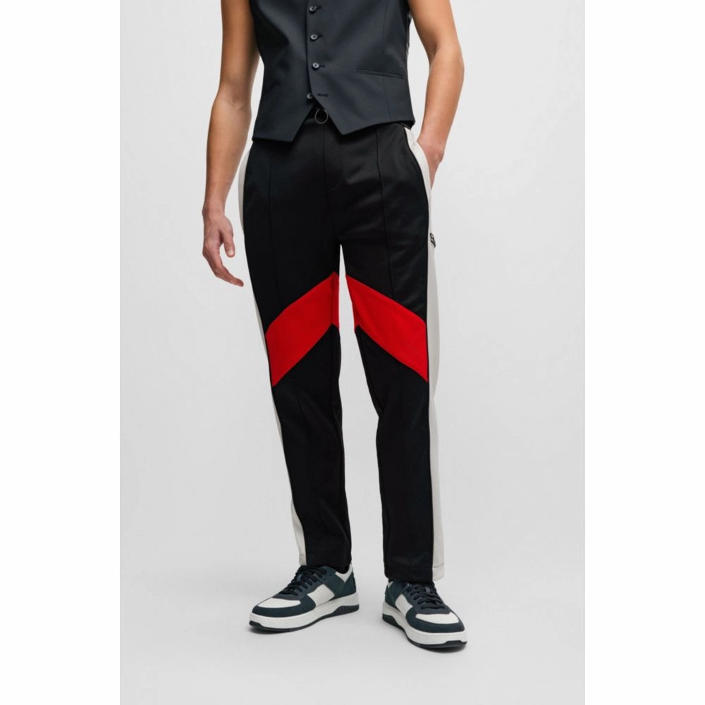 Relaxed-fit tracksuit bottoms with color-blocking