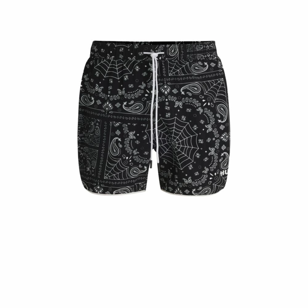 Seasonal-print swim shorts with round hem