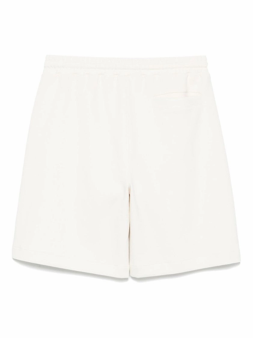 White Shorts With Drawstring Waist And Multiple Pockets